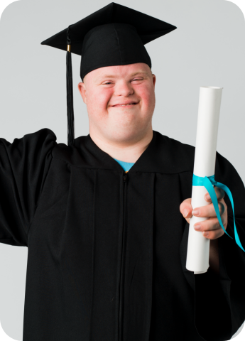 happy-boy-with-down-syndrome-in-a-graduation-gown-2021-09-02-06-42-17-utc